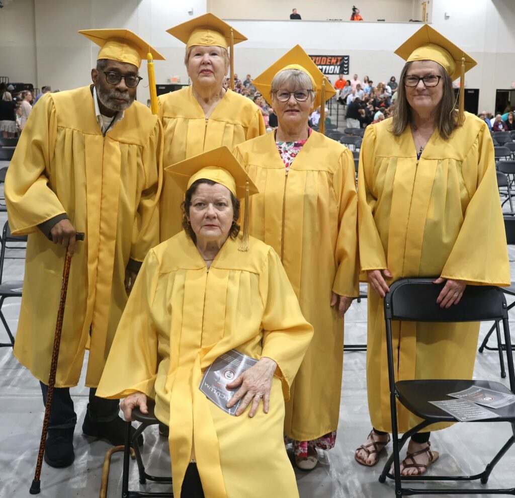 Standing, left to right, are David Harris, Susan Hartman, Barbara Davis McGavock and Cheryl Justice Tate. Seated is Debbie Gaby Tench. They are Golden Pioneers.