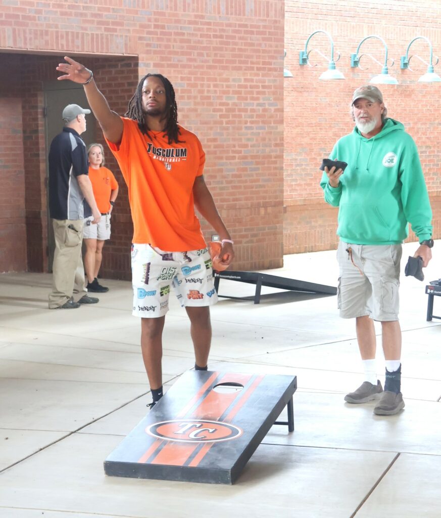 Tossing cornhole bags