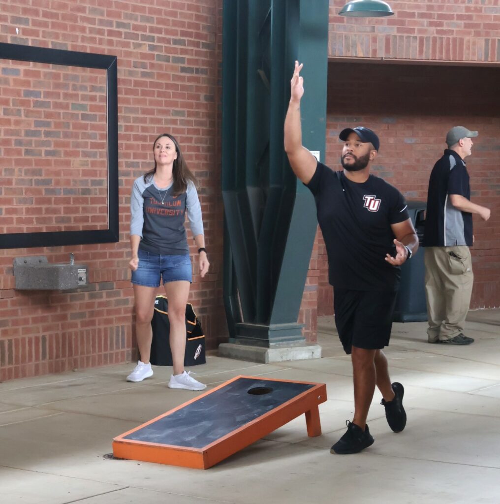 Tossing cornhole bags