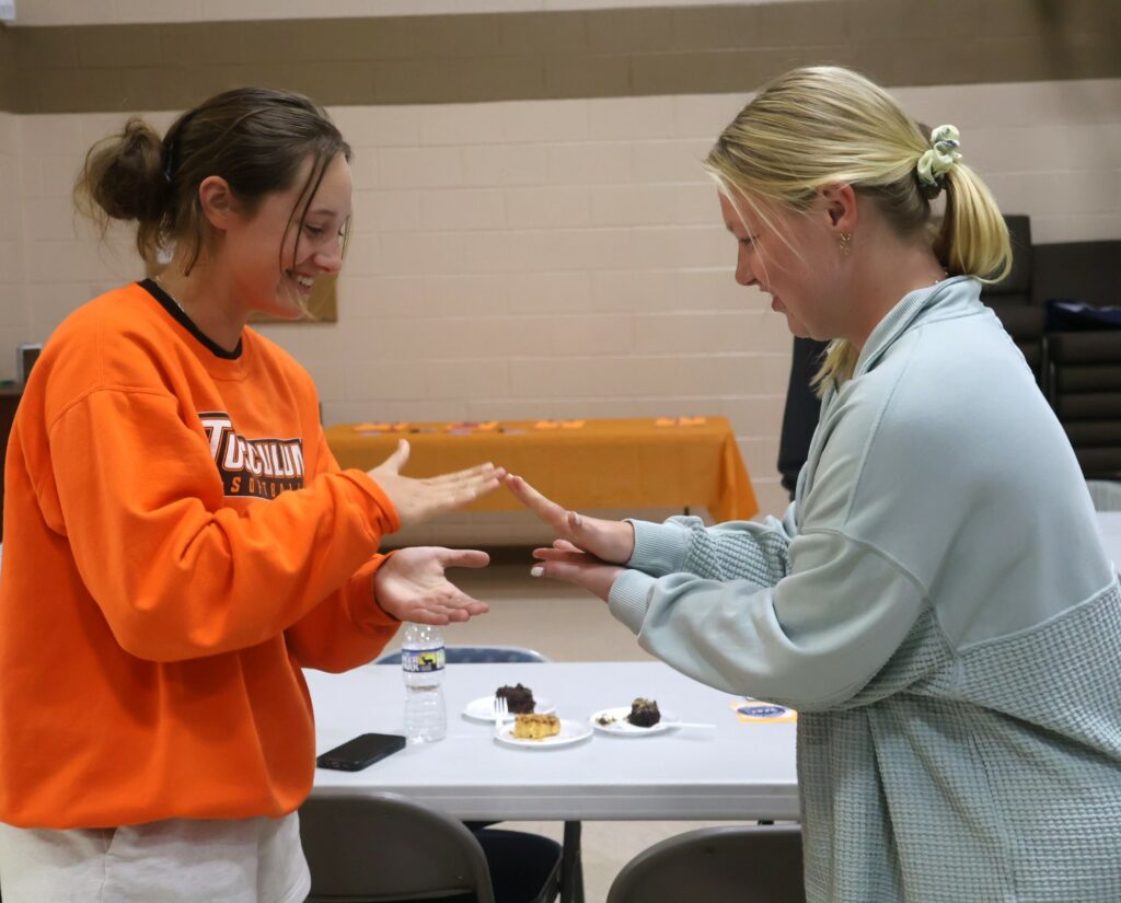 Two students play a game at SPOT.