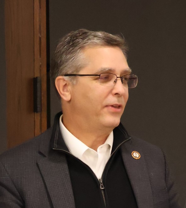 Dr. Scott Hummel speaks.