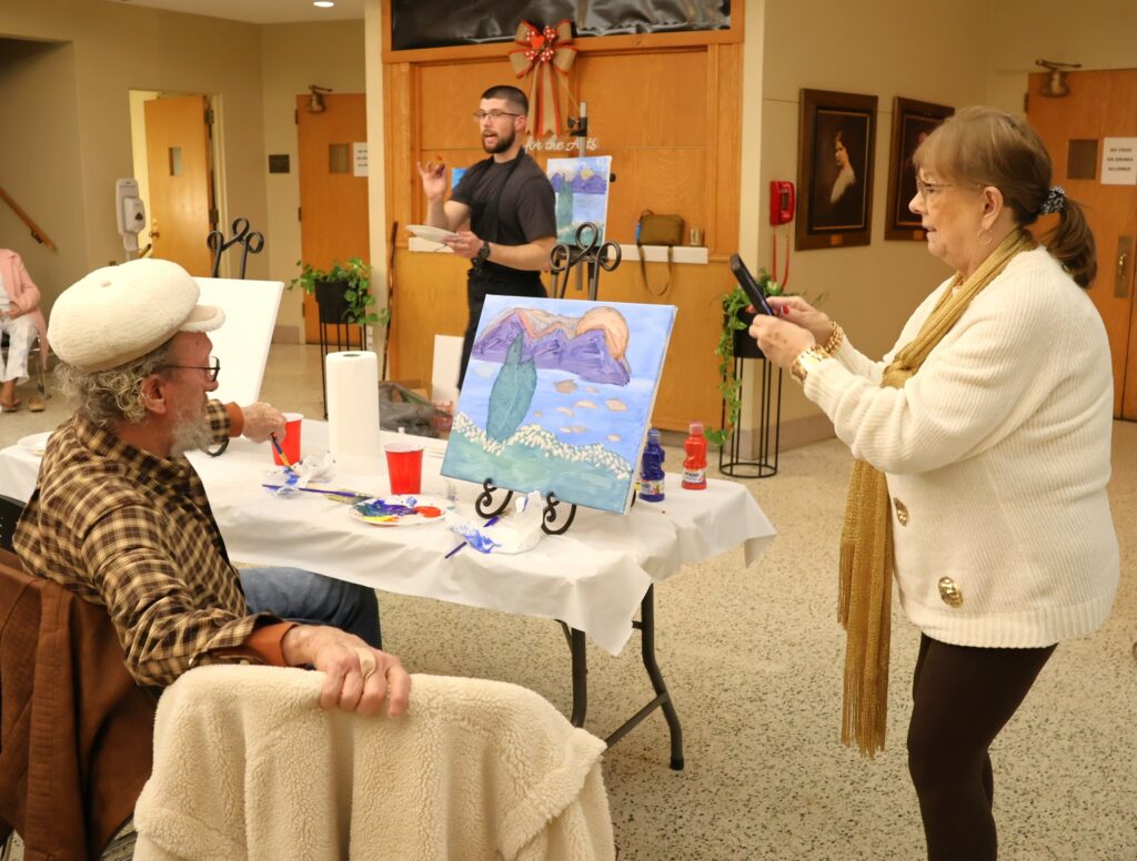 One of the participants takes a photo.