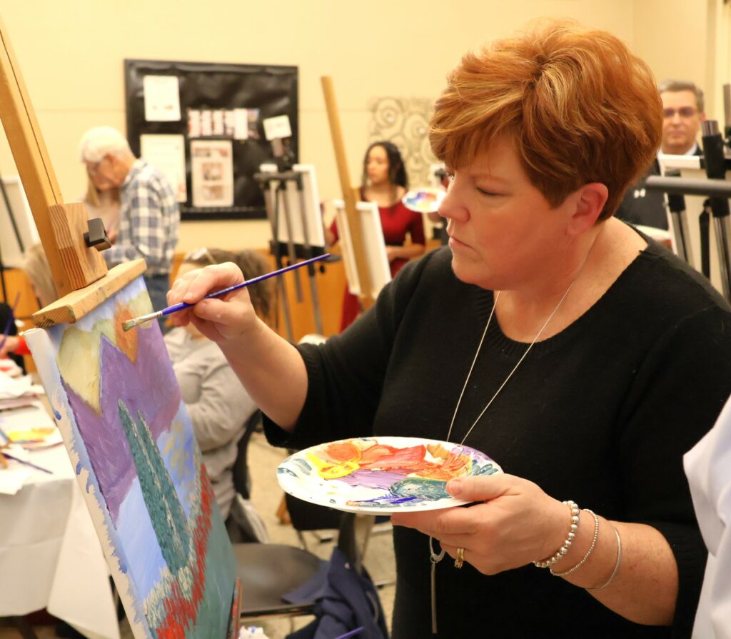 Elizabeth Roberts paints.