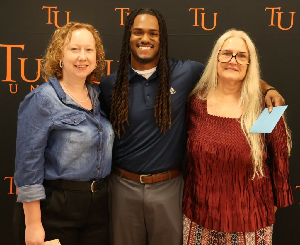 Left to right are Dr. Kate Smith, Adrian Robinson and Donna Myers.