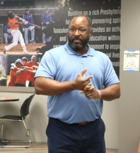 Steve Anderson, multicultural retention coach with Student Support Services, speaks with prospective students and their family members.