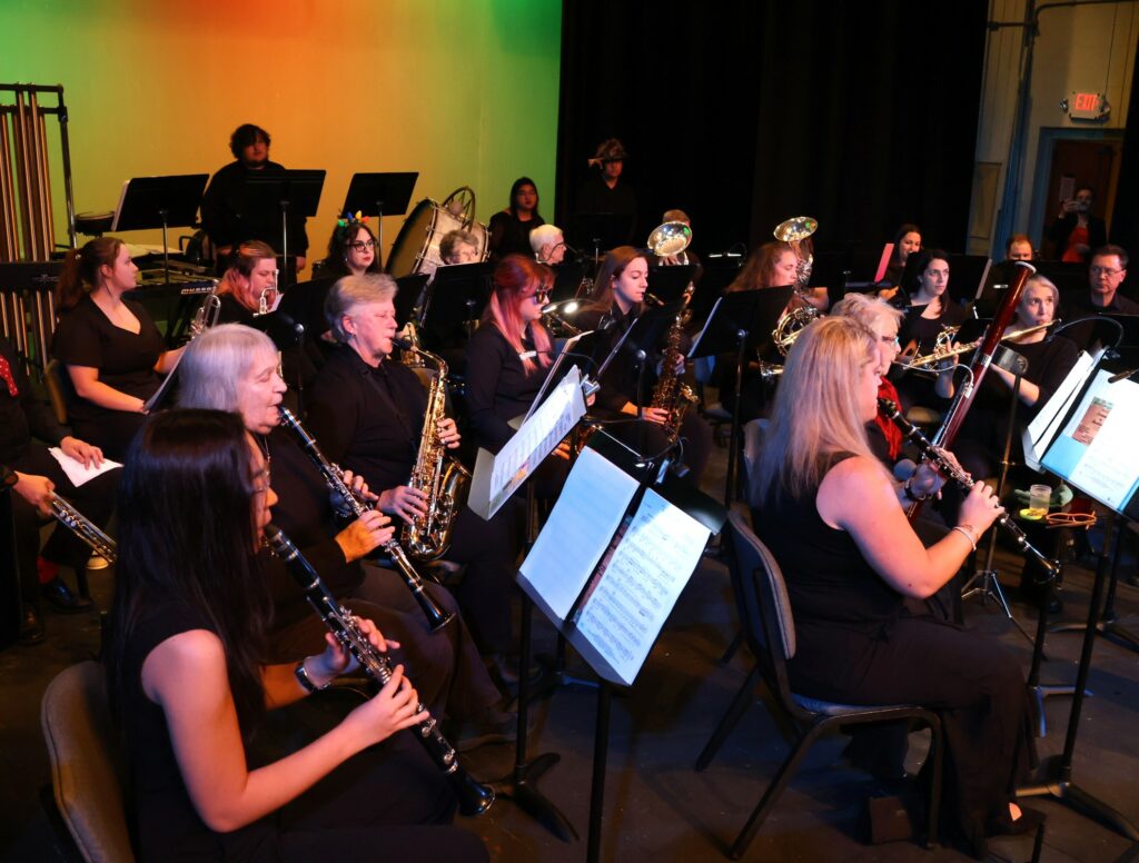 The band practices before the concert starts.