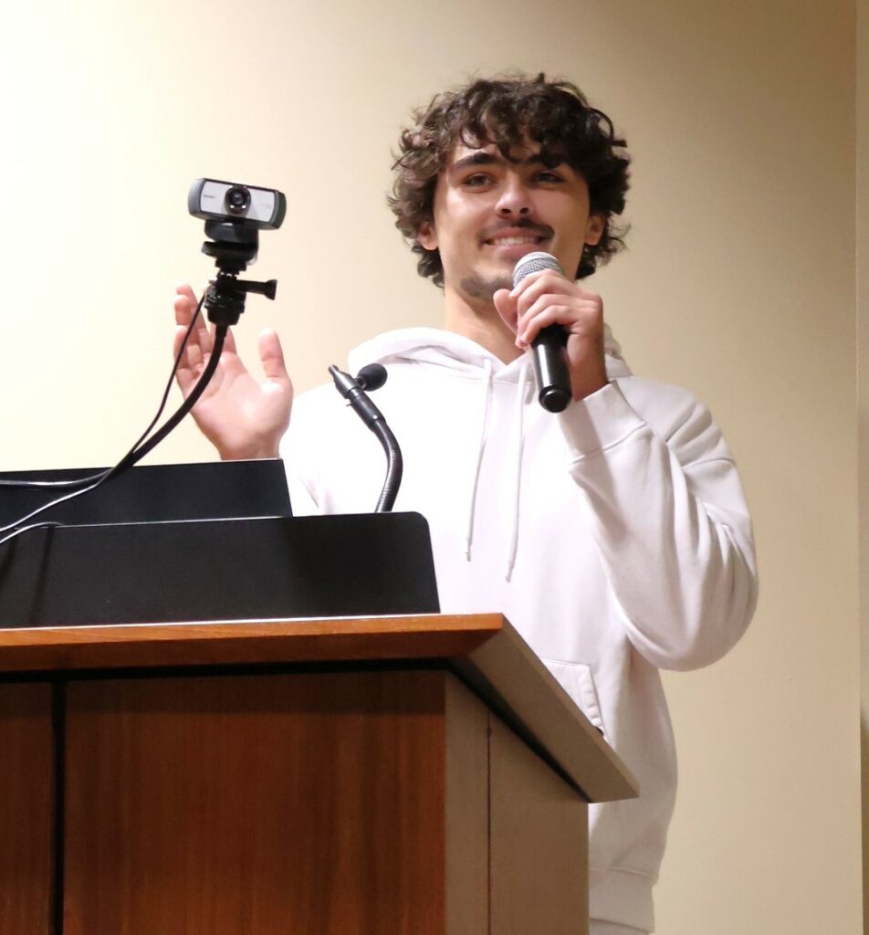 A student debates his point.