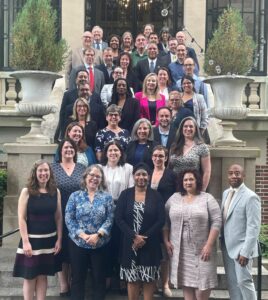 Dr. Heather Henson-Ramsey, second from the left in the bottom row, stands with other members of her cohort.