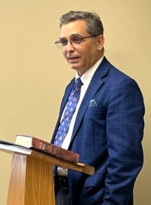 Dr. Scott Hummel presents at a chapel session.