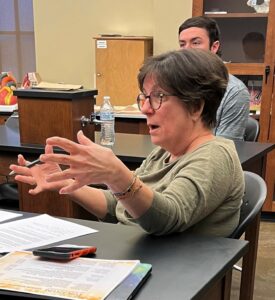 Dr. Susan Monteleone, foreground, speaks during the Natural Sciences Department’s senior seminar in 2022.