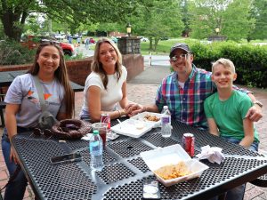 Guests enjoy a great meal from one of the food trucks.
