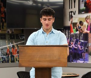 Tusculum student JP Campione reads from his writing at the festival.