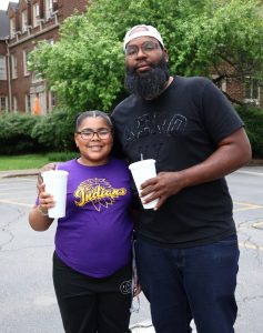 These two attendees have fun at the 2025 festival.