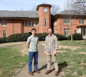 Tine Bowman, left, and Matt Sweeny stand in front of the Thomas J. Garland Library at Tusculum University.