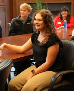 From left to right, Tusculum students Jerry Ricker and Savannah Webb and Meagan Stark, associate director of Student Support Services, enjoy a fun moment during Congresswoman Diana Harshbarger’s visit.