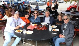 Alumni and others enjoy the Homecoming tailgate in 2023.
