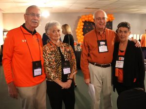 Left to right, Larry Coughlin, Donna Coughlin, Glen Rose and Jackie Rose enjoy a moment at the Alumni Dinner and Dance.
