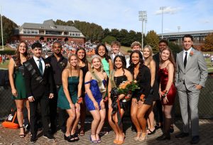 Homecoming court members gather for a photo after the ceremony. Missing are court members who are on the football team and returned to game action. 