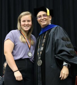 Dr. Scott Hummel, right, stands with Emma Harriman, the recipient of the President’s Award.