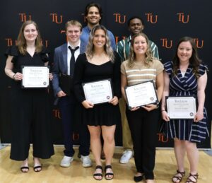 These are the recipients of the Pioneer I’s awards. Left to right are Samantha Nelson, Joseph Medeck, Jakob Svendsen, Emily Sappington, Andrae Robinson, Mary Winfrey and Maggie Vickers.