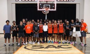 One of the students attended practices of the Tusculum men’s basketball team and posed with the players and coaches afterward on Tuesday, Sept. 22.