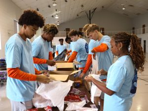 Students perform service work at Trinity United Methodist Church.