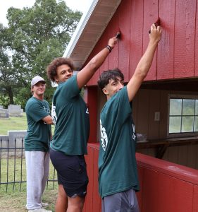 Tusculum students paint at Mt. Olive (Red Hill) Church.