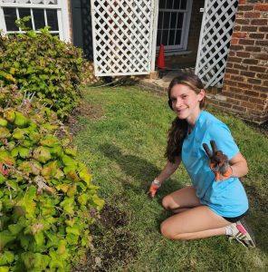 Abby Counter performs landscaping at the Dickson-Williams Mansion.