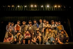 This is a group photo of newsies who are rehearsing for the musical “Newsies,” which is coming to The Capitol Theatre for six shows in April. Photo courtesy of Eric Kaltenmark of EK Photography