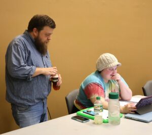 Steve Schultz, left, director of “Newsies,” and Faith Rader, the music director, work during the first day of rehearsals. Photo from Tusculum University