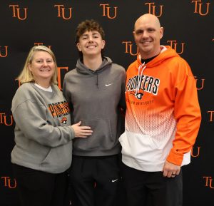 The Slover family poses for a photo. They are, left to right, Jennifer, Austin and Caleb.
