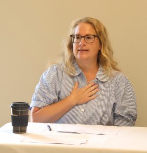 Holly Ratcliff, assistant professor of English, speaks to students in the Humanities Division.