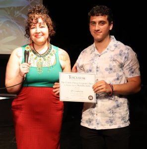 JP Campione, right, receives his prize.