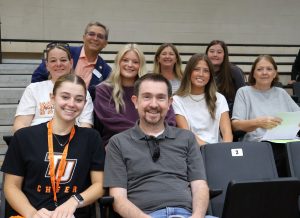 Dr. Scott Hummel, top left, joins incoming students and their families for a photo.