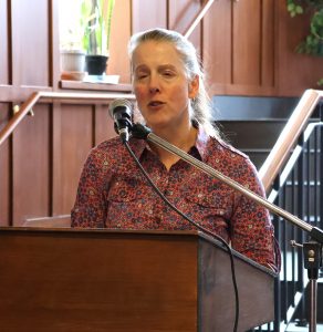 Kelsey Trom speaks at the event.