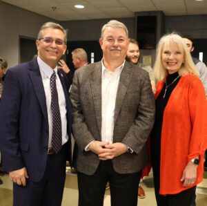 Left to right, Dr. Scott Hummel, Dr. Greg Nelson and Starr Hummel enjoy the event.