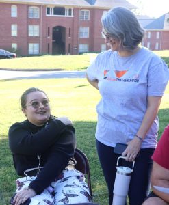 Rachael Barnett, right, speaks with SSS member Haylee Miller at an SSS event.