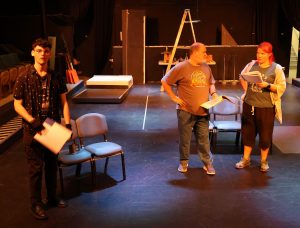Left to right, Sam Garland, Michael Fillers and Shelly Skelly-Ramos work on a scene.
