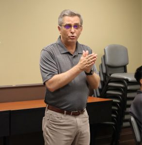 Dr. Scott Hummel speaks with the students.