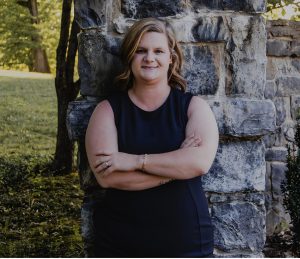 Elizabeth Tarlton stands at the Tusculum Arch. Photo by Hannah Vaughn