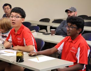Taylor Chen, second from the right in the foreground, competes at the Tusculum Earlybird in 2025.