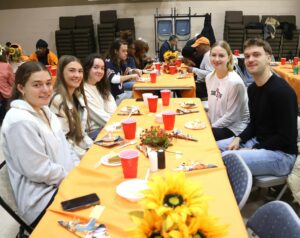 Students enjoy the Thanksgiving meal at Tusculum Baptist Church.