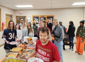 Tusculum students go through the serving line.