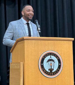 Tusculum alumnus Dionté Grey speaks at the university’s graduation in May.