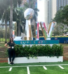 Brandy Thigpen stands in Miami, where she attended the Super Bowl in 2020.