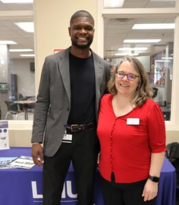 Dr. Heather Henson-Ramsey, right, Tusculum’s assistant vice president of academic affairs, stands with Jevon Joseph, director of recruitment and outreach at LMU-DCOM, meet during a career fair at Tusculum earlier this year.