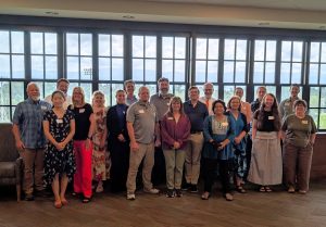 Representatives of higher education institutions in the Appalachian Undergraduate Research Alliance gather for a photo during their recent meeting at Tusculum.