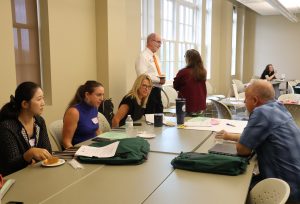 A group within the alliance engages in discussion during the two-day conference at Tusculum.
