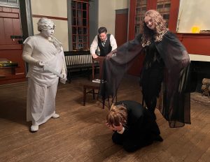 Actors perform during “Edgar Allan Poe and Other Haunted Stories in the Woods” in 2024.