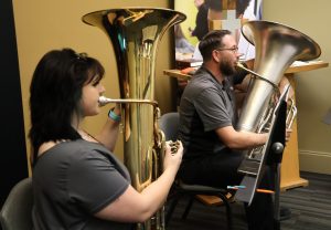 The tuba section practices